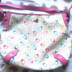 Coach’s crossbody bag in white/pink for sale